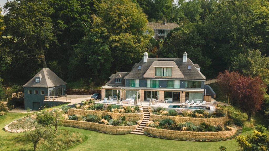 theescombe hill house Amberley Minchinhampton Common cover|Theescombe House Amberley a contemporary valley house|Theescombe House Amberley an amazing house|Theescombe House Amberley bed side table|Theescombe House Amberley breakfast table with a view|Theescombe House Amberley chill out space|Theescombe House Amberley cinema experience|Theescombe House Amberley coach house en suite bedroom|Theescombe House Amberley coach house living room|Theescombe House Amberley coach house shower room|Theescombe House Amberley coach house|Theescombe House Amberley dining table detail|Theescombe House Amberley dusk dining room|Theescombe House Amberley en suite king bedroom|Theescombe House Amberley entrance hall|Theescombe House Amberley evening drinks|Theescombe House Amberley flowers|Theescombe House Amberley flowing living space|Theescombe House Amberley free flowing space|Theescombe House Amberley gym|Theescombe House Amberley hats|Theescombe House Amberley king bedroom|Theescombe House Amberley kitchen dining room with a view|Theescombe House Amberley kitchen dining room|Theescombe House Amberley kitchen island|Theescombe House Amberley kitchen spice racks|Theescombe House Amberley kitchen with a view|Theescombe House Amberley landing|Theescombe House Amberley light and airy|Theescombe House Amberley long L shaped sofa|Theescombe House Amberley master bedroom with a view|Theescombe House Amberley master en suite bedroom|Theescombe House Amberley minchinhampton common|Theescombe House Amberley open plan bar sitting room|Theescombe House Amberley open plan kitchen dining room|Theescombe House Amberley open planning dining room and kitchen|Theescombe House Amberley perfect sunday roast|Theescombe House Amberley sideboard|Theescombe House Amberley sitting room|Theescombe House Amberley small breakfast table|Theescombe House Amberley starry night|Theescombe House Amberley swimming pool from above|Theescombe House Amberley swimming pool terrace view|Theescombe House Amberley swimming pool with amazing view|Theescombe House Amberley swimming pool|Theescombe House Amberley terrace steps|Theescombe House Amberley the bar|Theescombe House Amberley winstons bar|woodchester valley pinot rose 2021|woodchester valley vineyard wines selection|valley view|theescombe hill house Amberley Minchinhampton Common weights|theescombe hill house Amberley Minchinhampton Common loungers|theescombe hill house Amberley Minchinhampton Common pool loungers|theescombe hill house Amberley Minchinhampton Common steps|theescombe hill house Amberley Minchinhampton Common the house|theescombe hill house Amberley Minchinhampton Common aerial view|theescombe hill house Amberley Minchinhampton Common terrace|theescombe hill house Amberley Minchinhampton Common pool|theescombe hill house Amberley Minchinhampton Common sitting room|theescombe hill house Amberley Minchinhampton Common snooker table|theescombe hill house Amberley Minchinhampton Common electric piano|theescombe hill house Amberley Minchinhampton Common gym|theescombe hill house Amberley Minchinhampton Common hat bedroom|theescombe hill house Amberley Minchinhampton Common pale bedroom|theescombe hill house Amberley Minchinhampton Common pink bedroom|theescombe hill house Amberley Minchinhampton Common bedroom details|theescombe hill house Amberley Minchinhampton Common woodchester valley views|theescombe hill house Amberley Minchinhampton Common open plan guest house|theescombe hill house Amberley Minchinhampton Common the guest house|theescombe hill house Amberley Minchinhampton Common magnificent views|theescombe hill house Amberley Minchinhampton Common landing|theescombe hill house Amberley Minchinhampton Common green bedroom|theescombe hill house Amberley Minchinhampton Common guest house bedroom|theescombe hill house Amberley Minchinhampton Common guest house shower|theescombe hill house Amberley Minchinhampton Common guest house kitchen|theescombe hill house Amberley Minchinhampton Common guest house|theescombe hill house Amberley Minchinhampton Common gated drive|theescombe hill house Amberley Minchinhampton Common swimming pool terrace